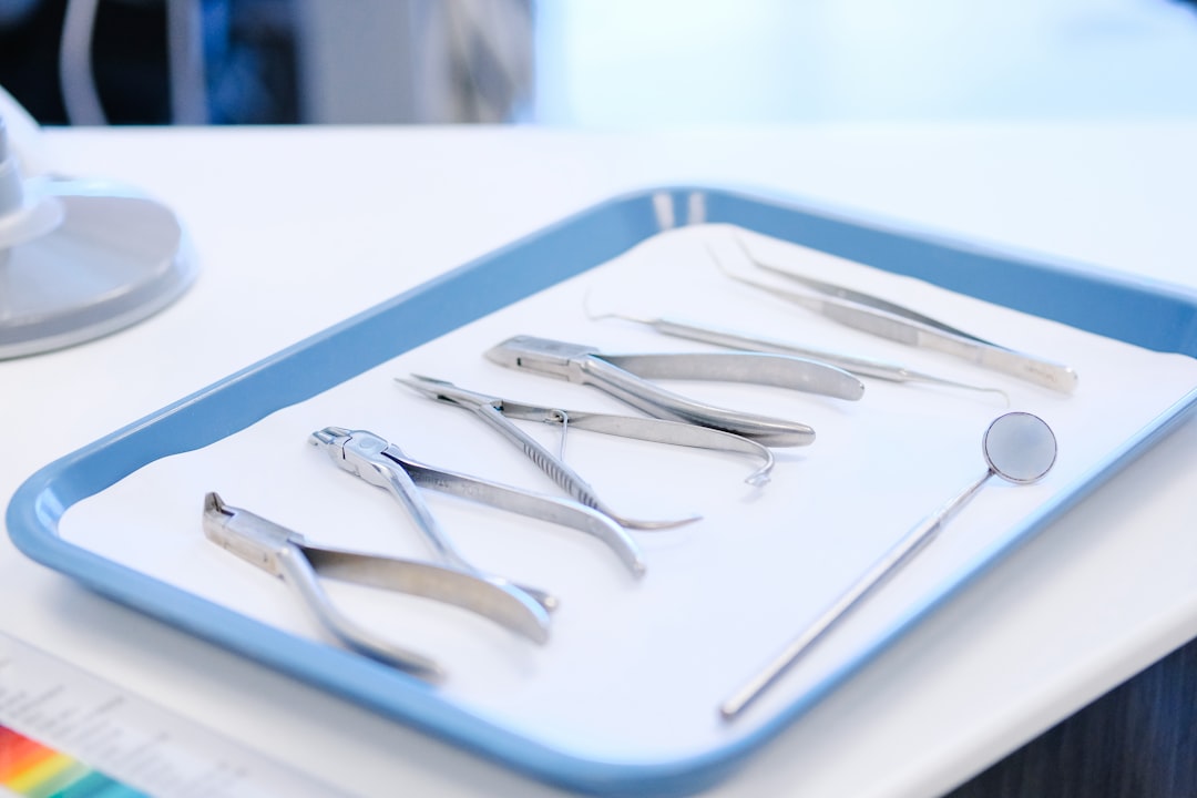 A tray of dental instruments prepared for treatment